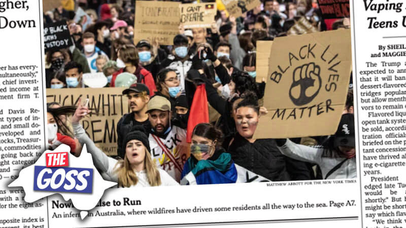 image shows a crowd of angry protestors holding up Black Lives Matter signs